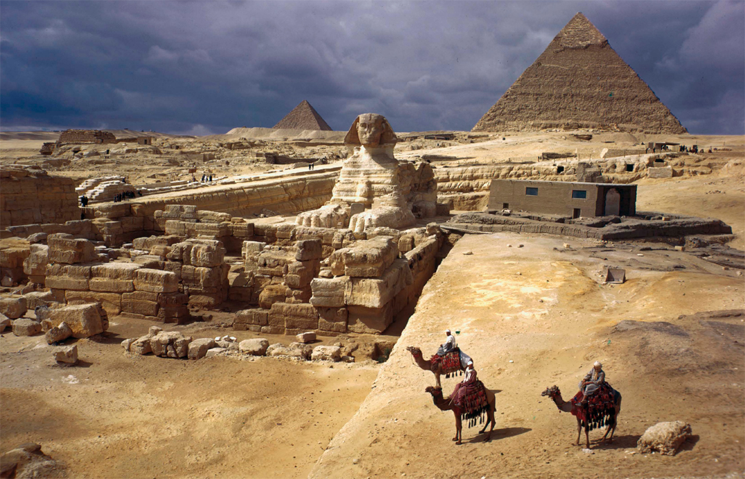 “The pyramids of the Pharaohs Khufa (right) and Khafra (left) rise behind the Great Sphinx of Giza.”